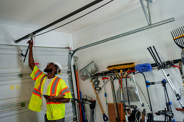 Professional Garage Door Panel Replacement technician working in Conneaut, OH